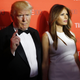 U.S. Republican presidential candidate Donald Trump and his wife Melania pose for photographers on the red carpet as they arrive for the TIME 100 Gala in Manhattan, New York, April 26, 2016.